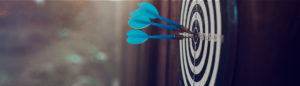 multiple blue arrows in bullseye